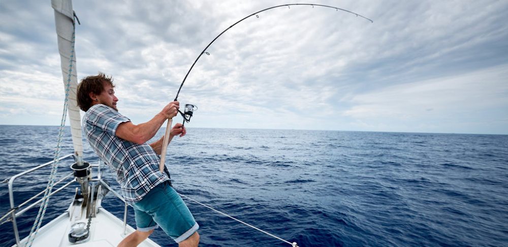 Man fishing on a yacht