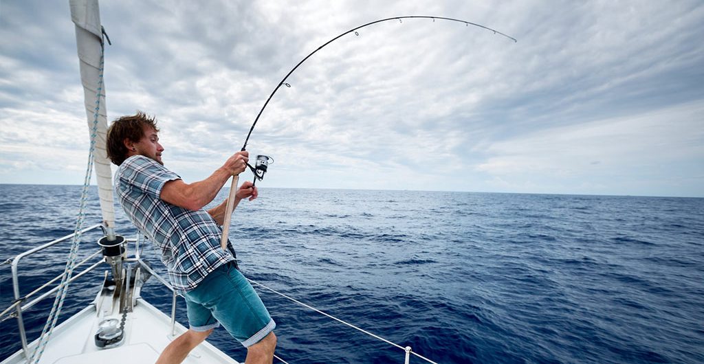 Man fishing on a yacht